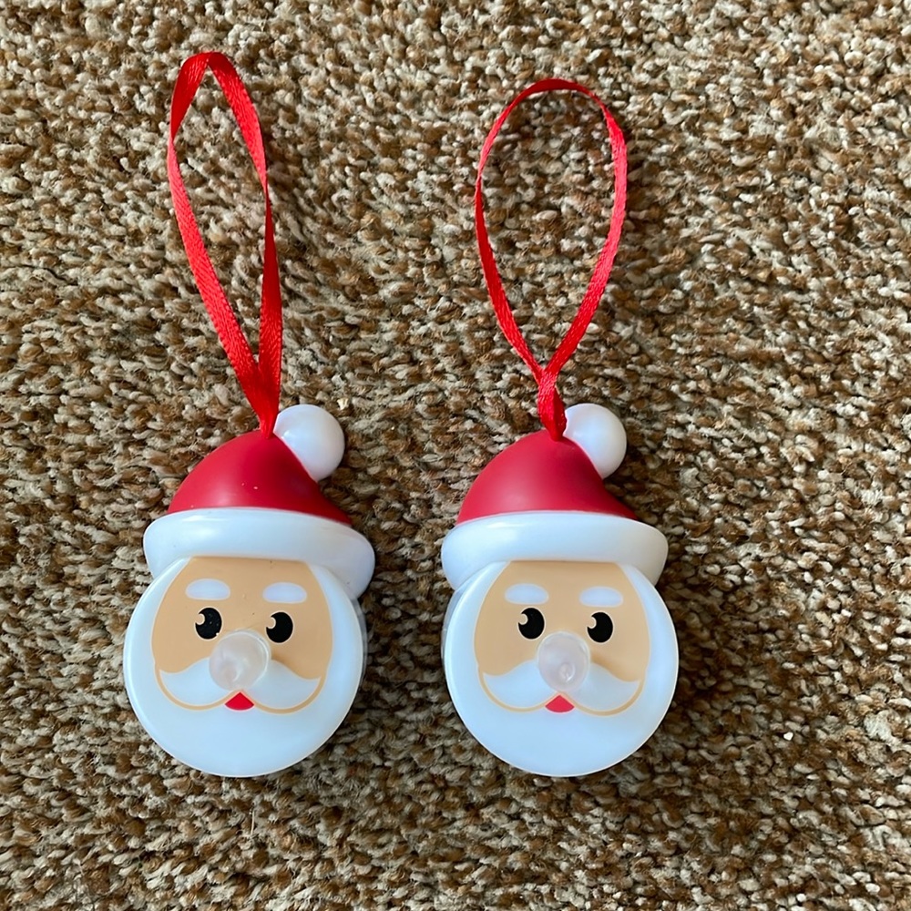 2 Santa light up ornaments